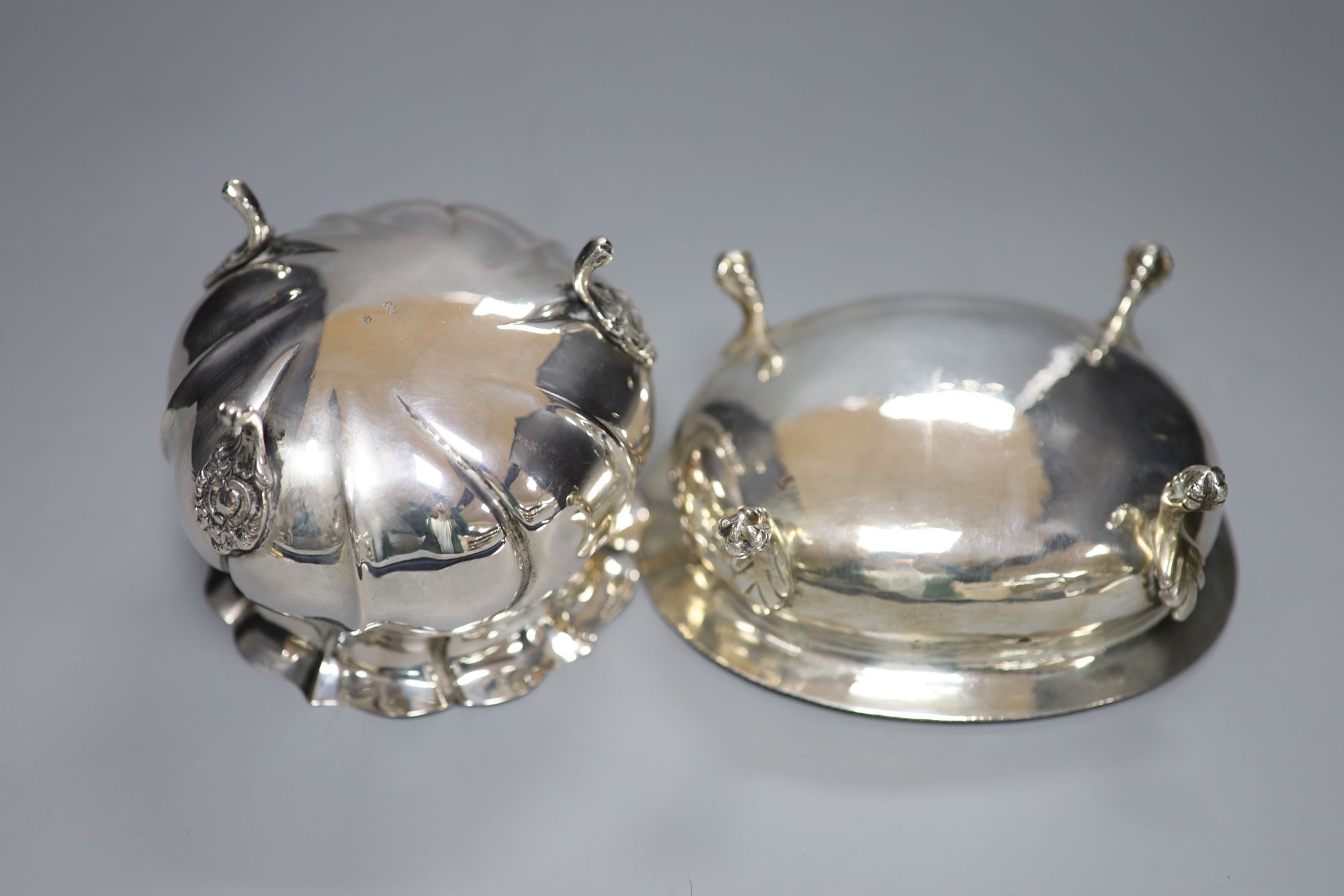 An Italian 800 standard silver oval sugar bowl and a similar circular fluted lobed bowl, 14.4oz
